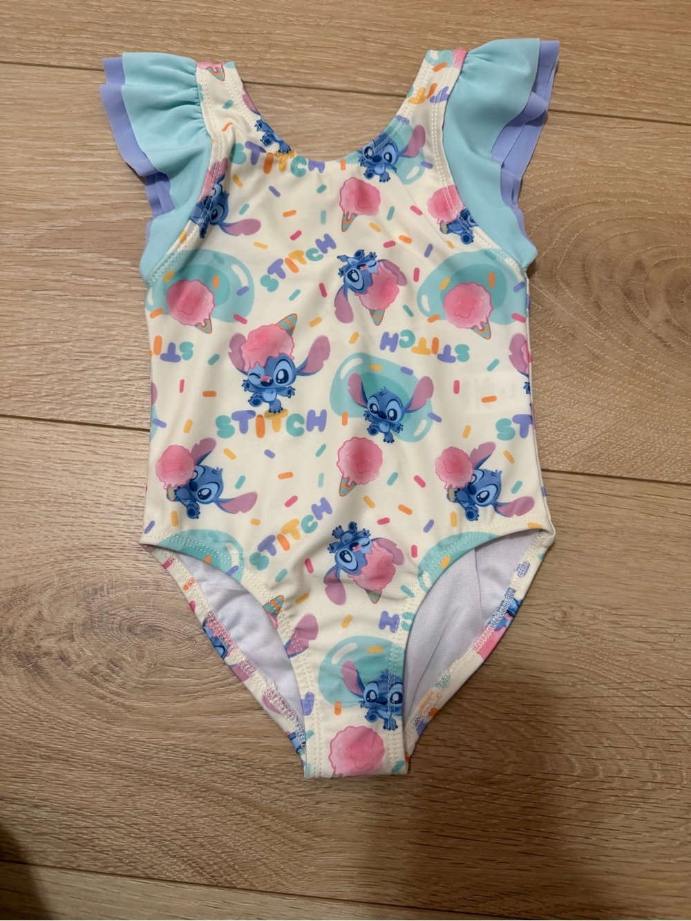 Disney Girls Cream, Blue & Pink Stitch One-Piece Swimsuit